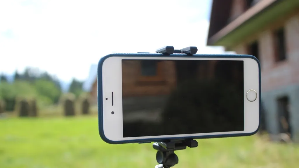 Smartphone on a tripod recording creator video outdoors