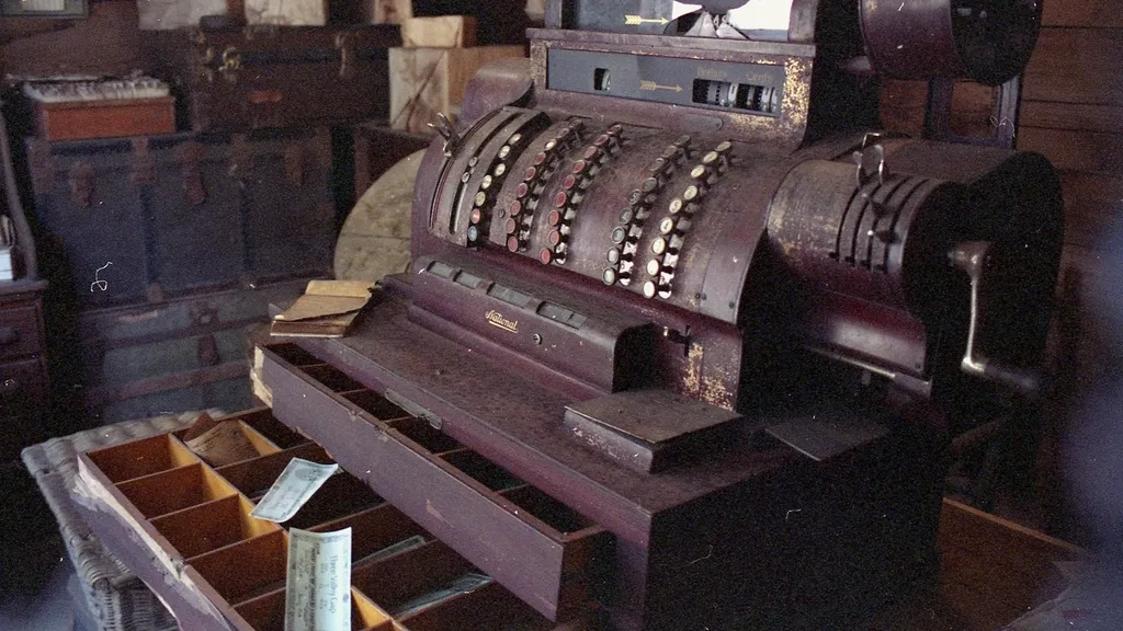 Antique cash register on a shop counter